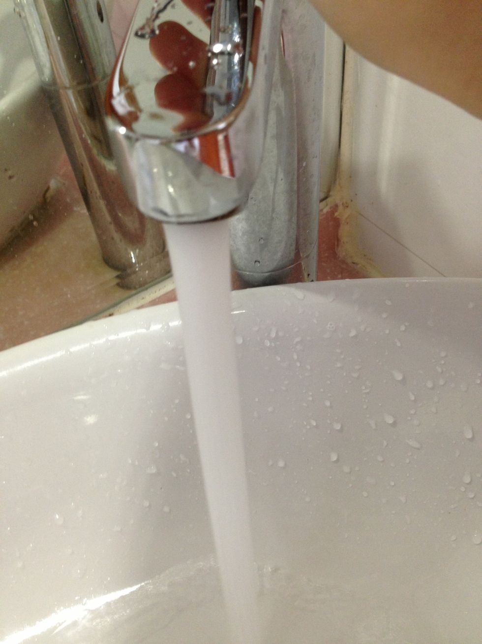Add lukewarm water until the bottle is almost full. Put the cap on and shake all of the contents together. If you don't think you put enough salt, add more to the mixture while the water is still warm
