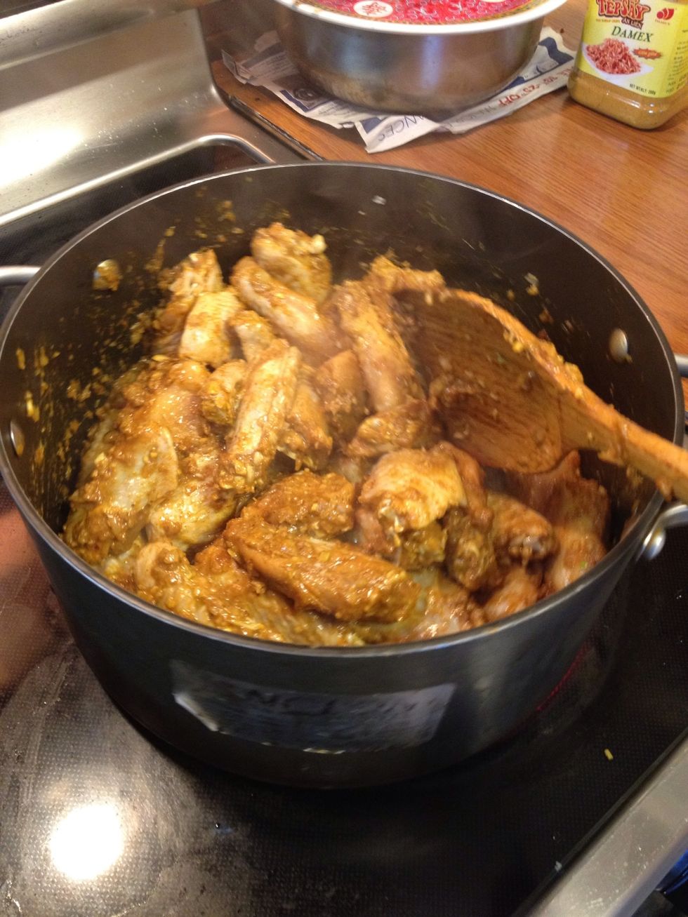 Add marinated chicken and let it cook