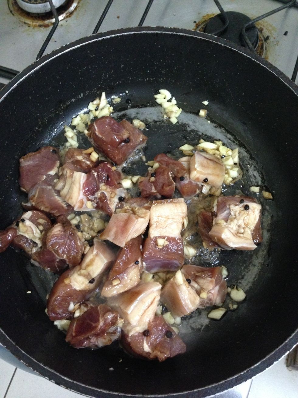 Add marinated pork. Simmer for 10 to 15 mins