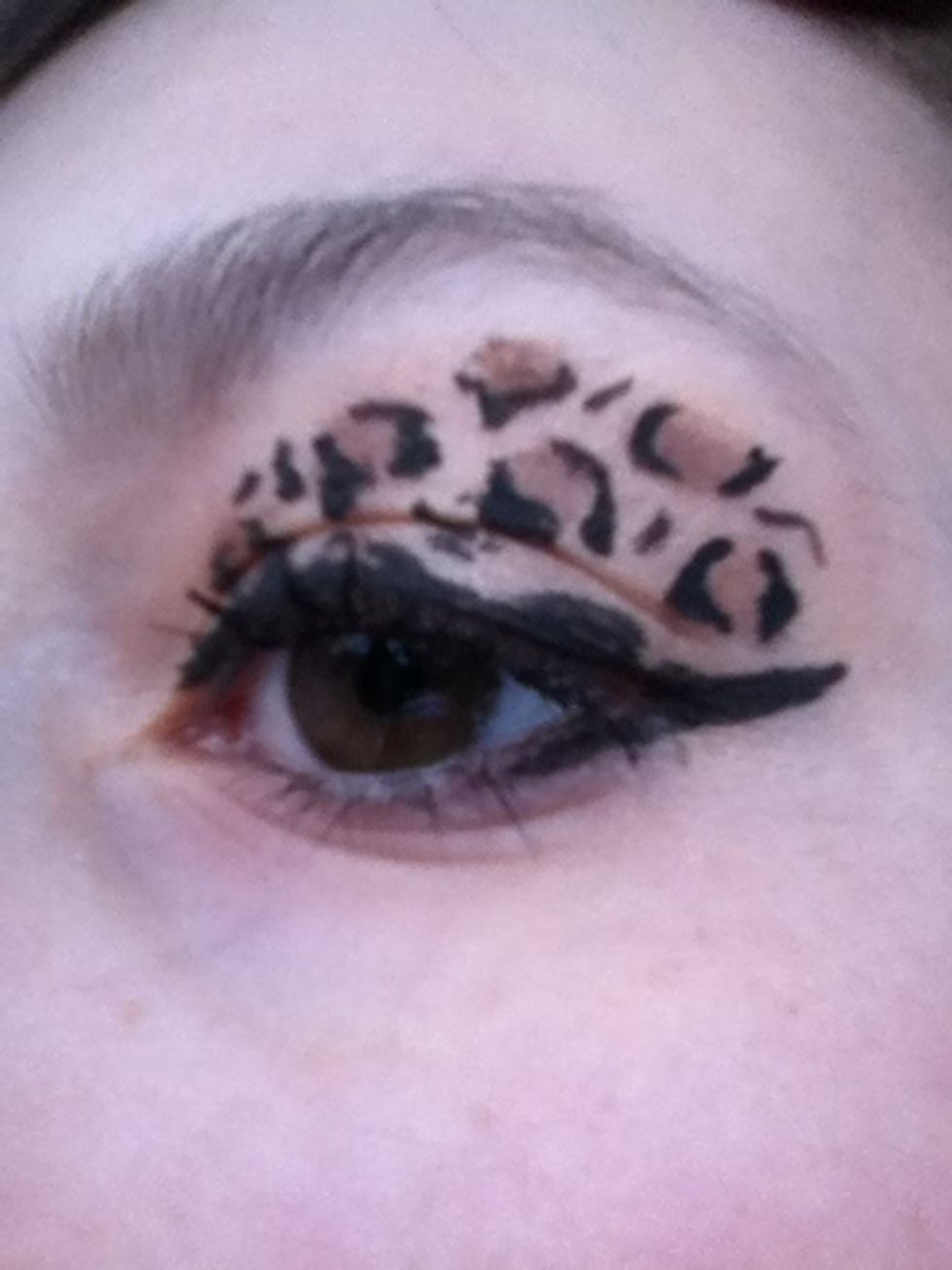 Add mascara or fake lashes to your eyelashes.