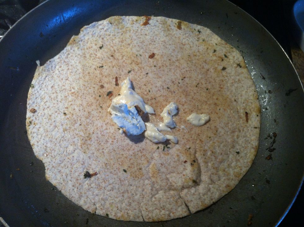 Add mayo and cream cheese onto the wrap. (I used herb and garlic cream cheese)