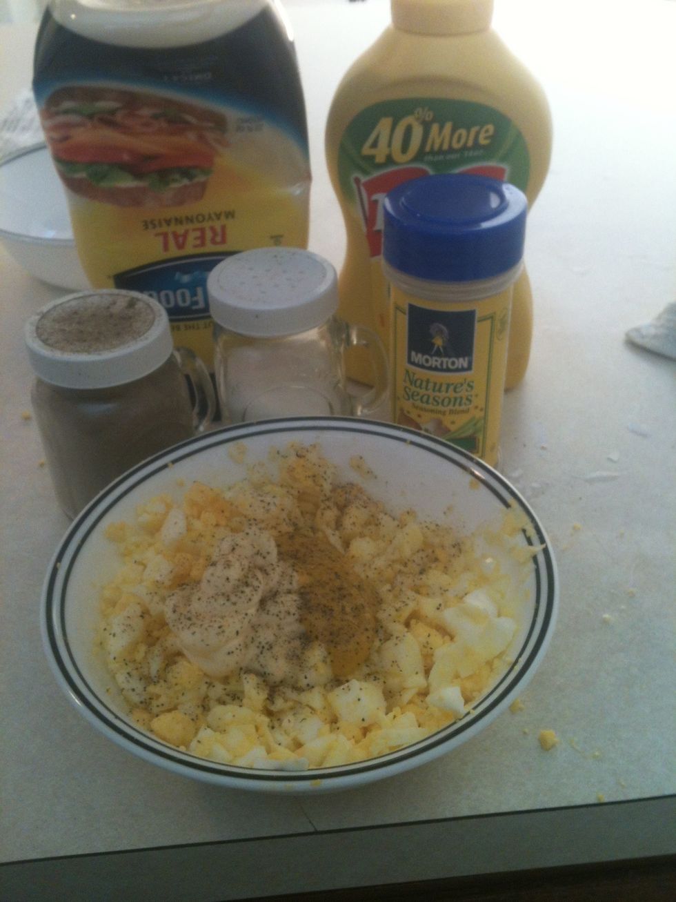 Add mayo, mustard, salt, pepper, and natures seasoning