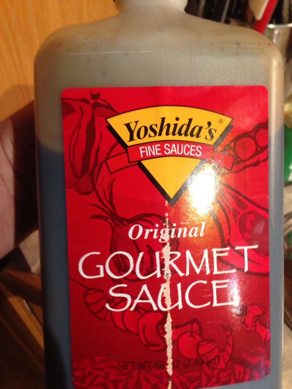 Add meat to mushrooms and then add yoshida sauce and simmer