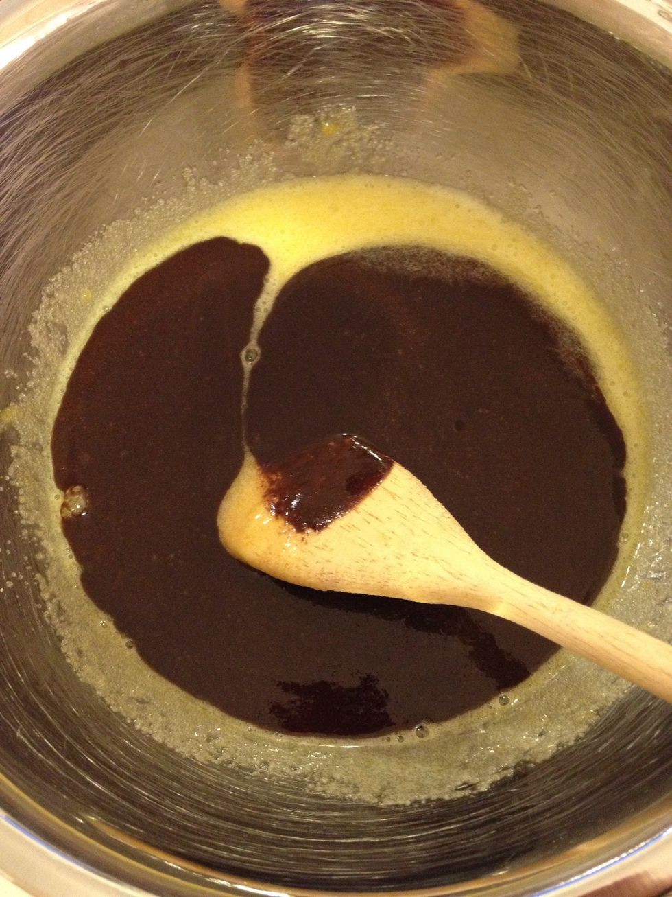 Add melted mixture to sugar and egg mixture and mix.