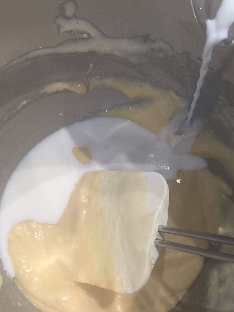 Add milk all or one part. The batter has to be loose but not runny