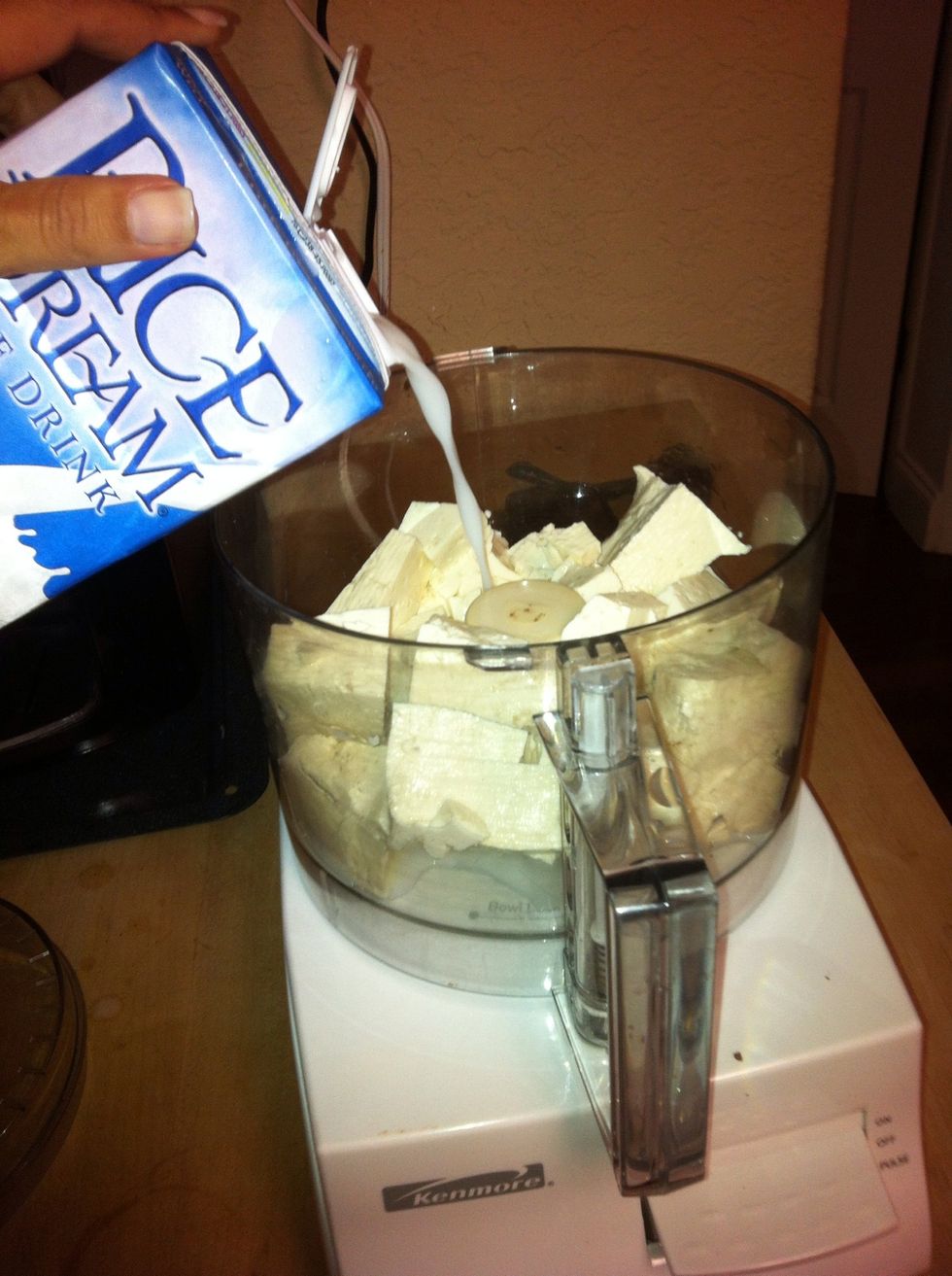 Add milk alternative to food processor. Put 1/2 cup first and add more at the end if needed.