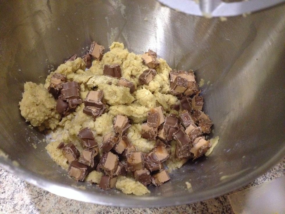 Add milk and 2 coarsely chopped Mars bars