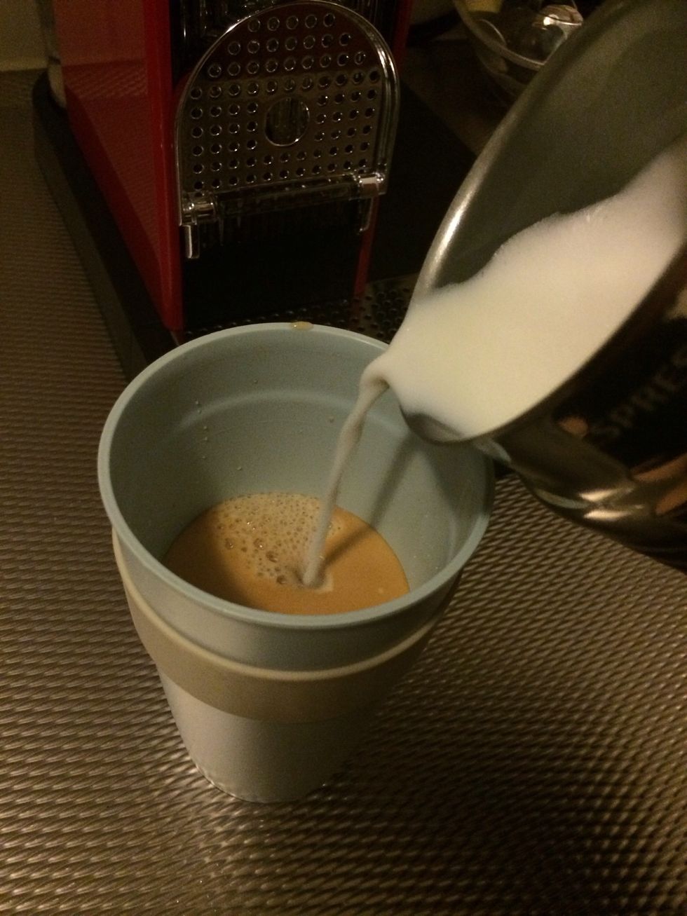 Add milk and scoop the foam on top of your latte.