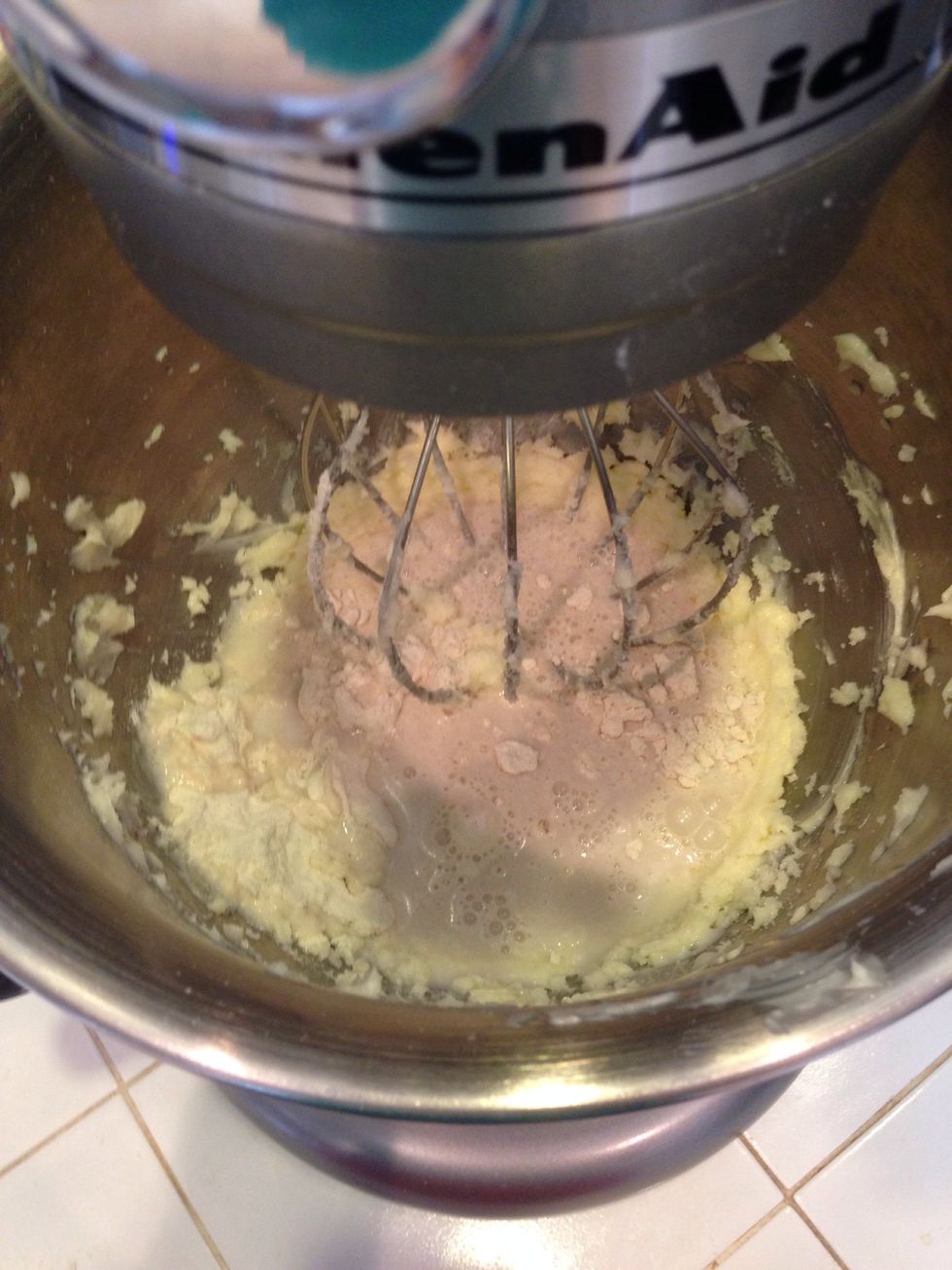 Add milk, baking powder, and salt.