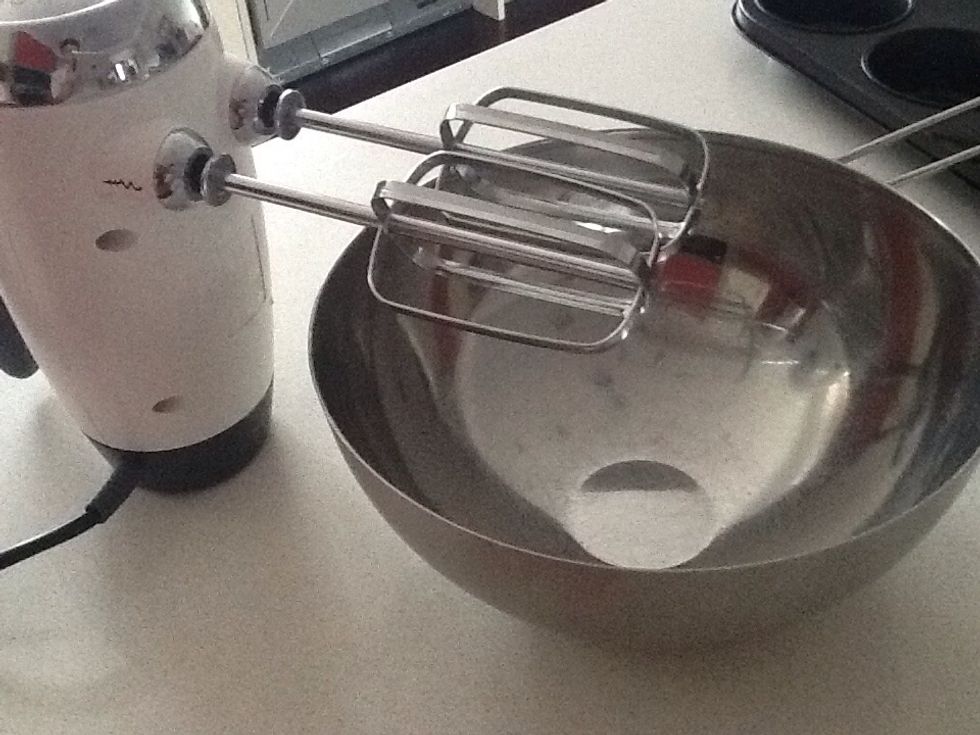 Add milk, flour, vanilla and rose water, and stir to combine. Beat with an electric mixer for 2 minutes, until light and creamy.