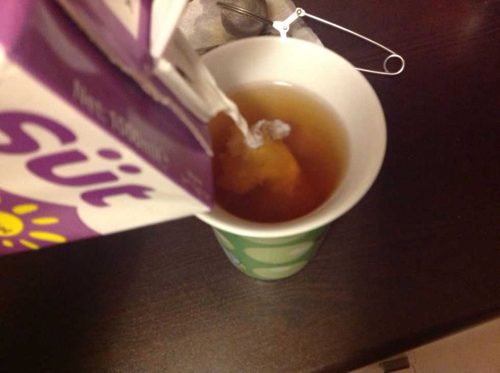 Add milk just enough to get the level back to where it was when the strainer was in.