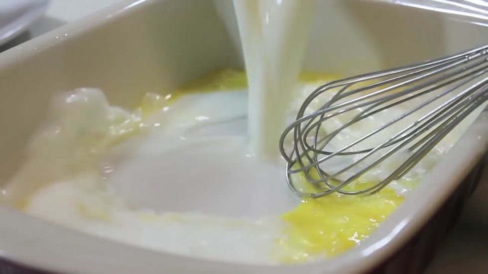 Add milk or heavy cream to the beaten eggs