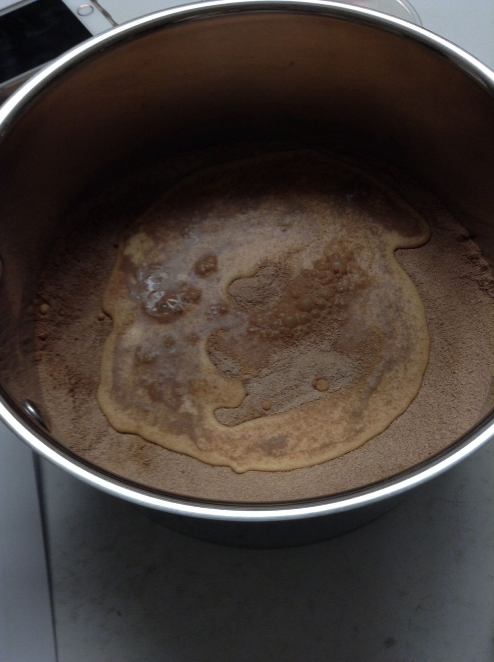 Add milk to sugar and cocoa and mix.