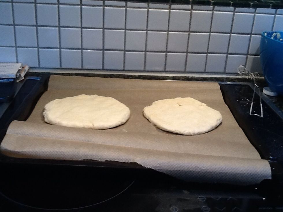 Add milk to the dough and it will look like this... Then you take the dough and split it in to two parts.