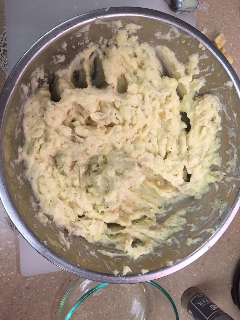 Add milk to the potatoes and add milk/heavy cream to make it as creamy as you want.
