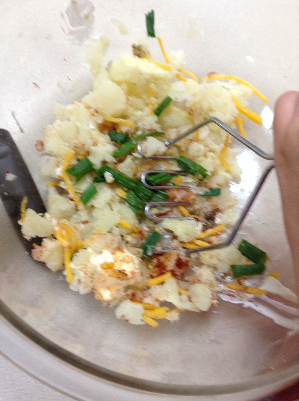 Add milk too (roughly 1 tablespoon)  and then mash it up!