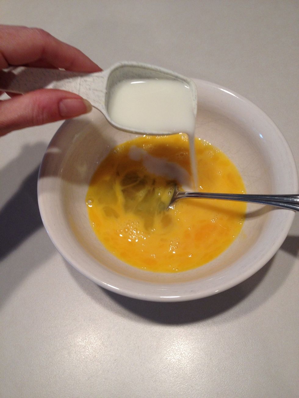 Add milk. Whisk again.