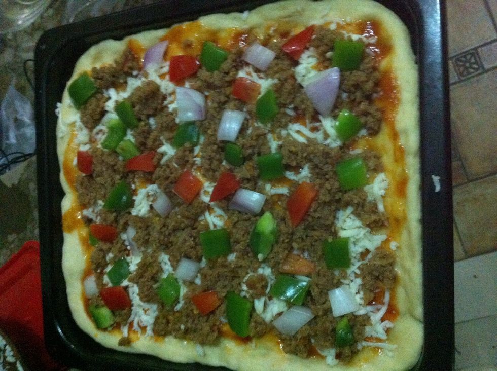 add minced beef mixture, capsicum and tomatoes and bake