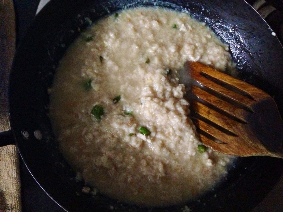 Add minced chicken and chicken stock. Cook for 10 mins till the chicken cooks and a little of the stock evaporates.
