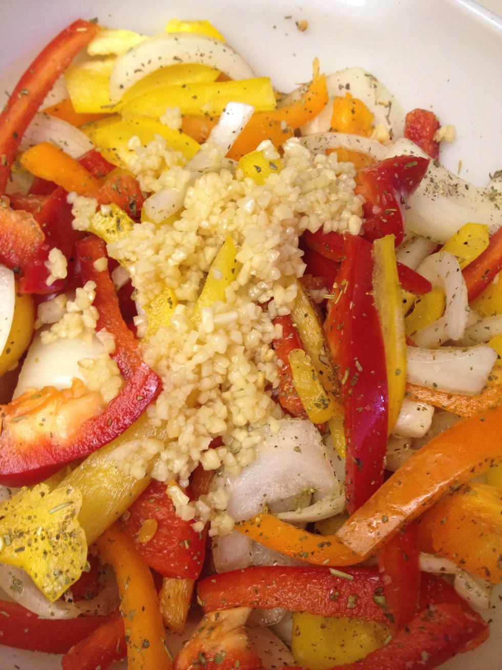 Add minced garlic. Mix.