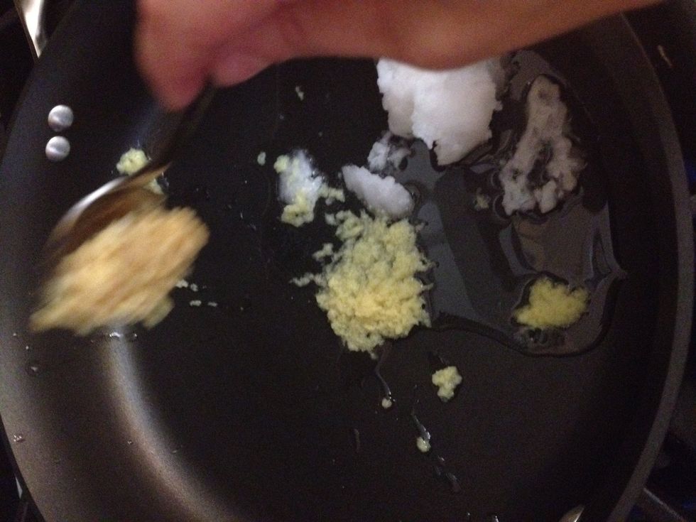 Add minced ginger and garlic