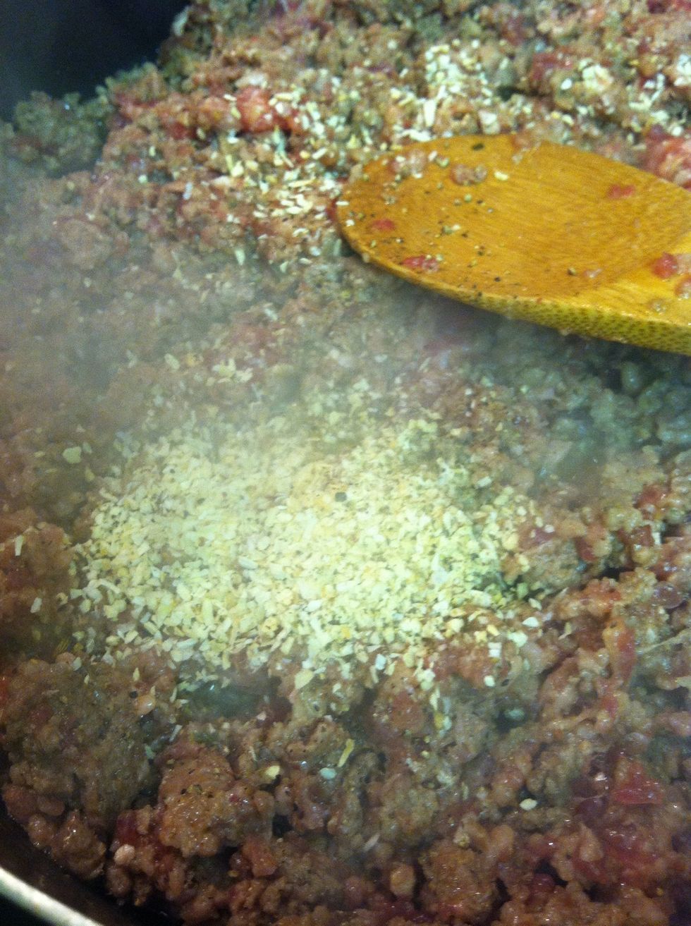 Add minced onion to meat.