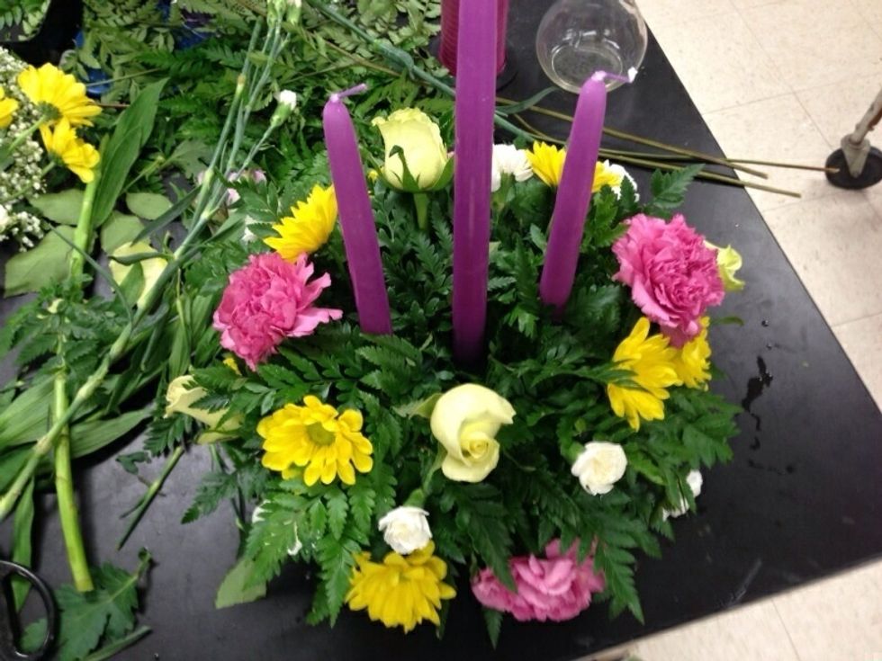 Add mini carnations as a filler for spaces