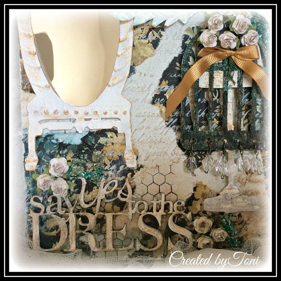 Add mini roses to the canvas and I brushed a bit of Art Ingredients Rust Mica on the tops and here and there throughout the canvas.