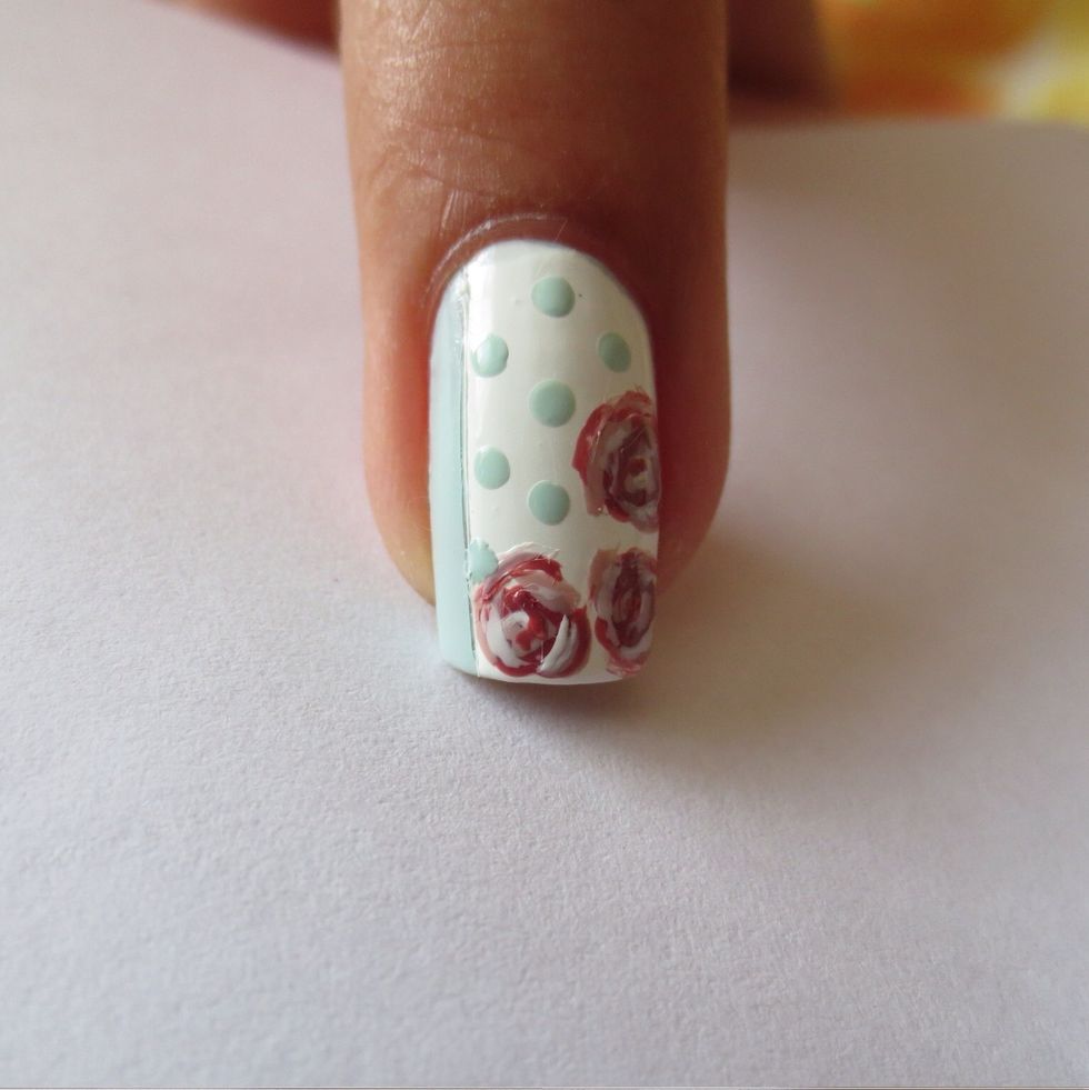 add mint green polkadots onto the clear white area with a medium dotting tool or toothpick