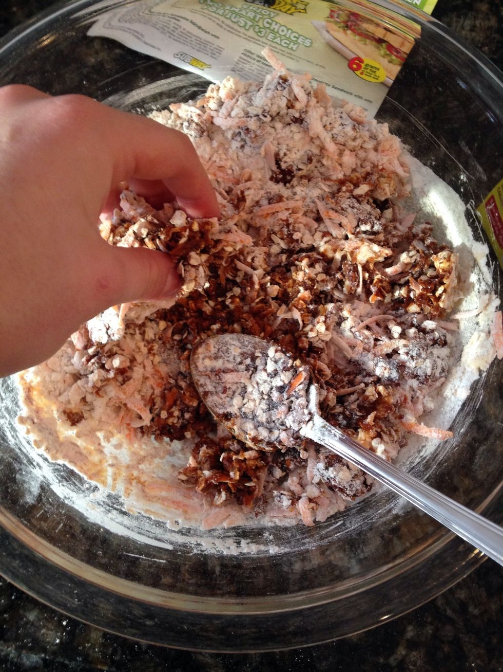 Add molasses and water and stir. It may be easier to stir with your hands. Also, add up to a 1/4 cup more molasses as needed to completely mix the batter.