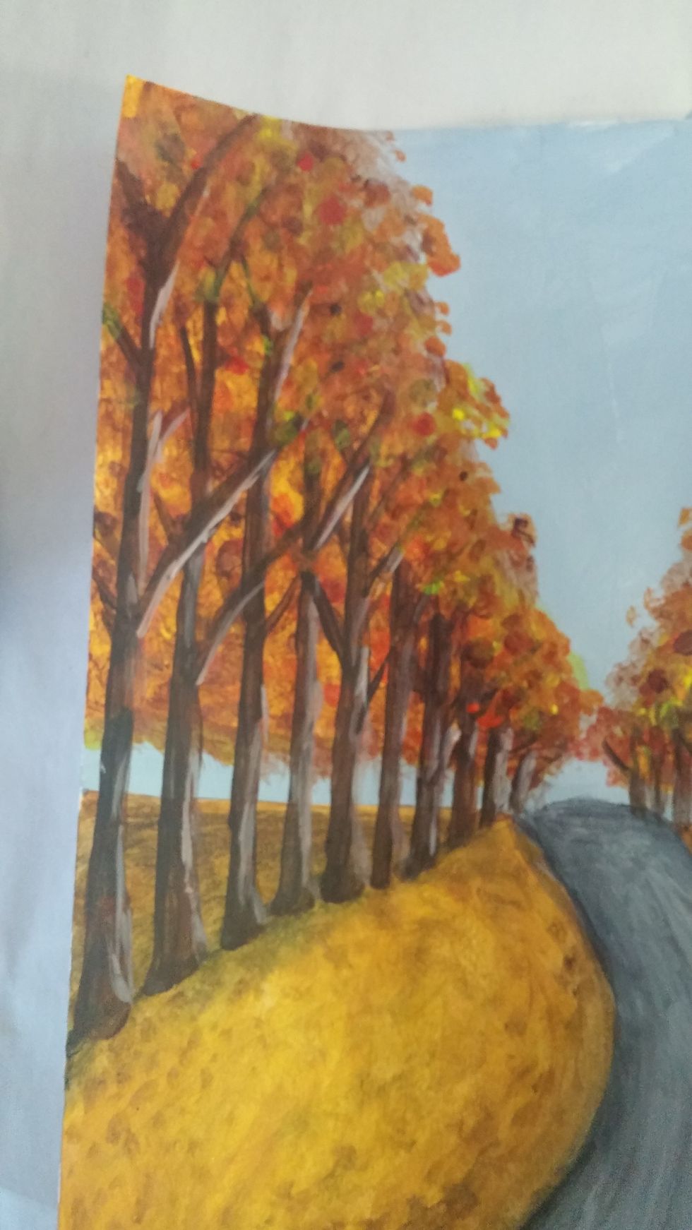 Add more and more of the leaves colors to the ends of the branches. Don't overdo it, just add bunches here and there.