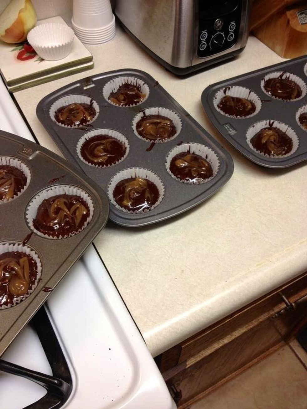 Add more brownie mix on top and a little caramel, then swirl it with a toothpick.