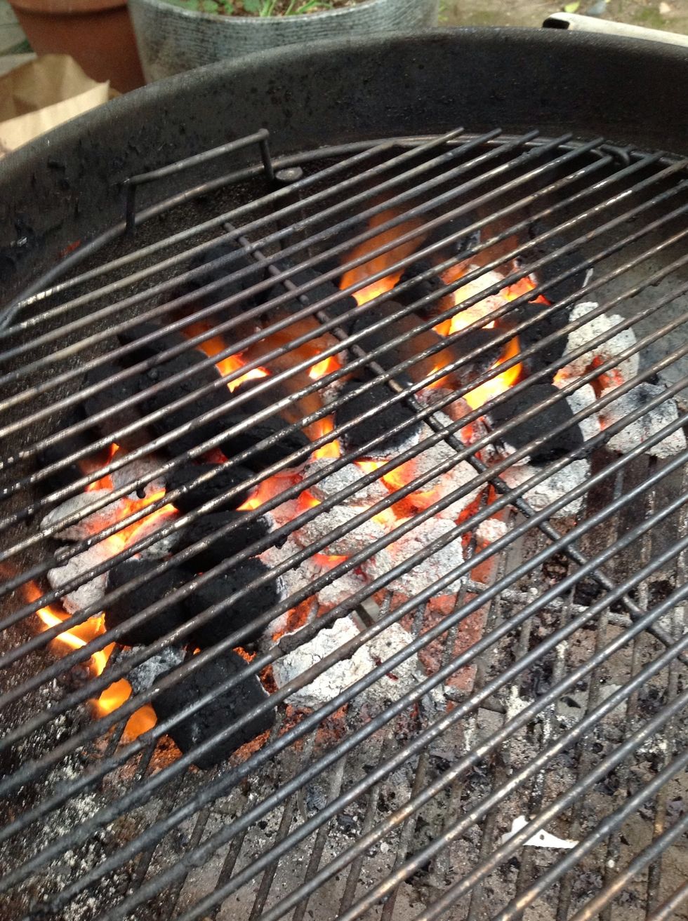 Add more charcoal for more heat. Get to cookin'!