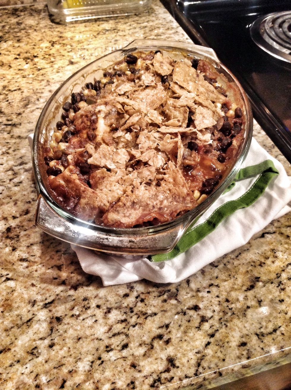 Add more crushed tortillas over the top and place in the oven to bake for 35 to 40 minutes on 400 degrees.