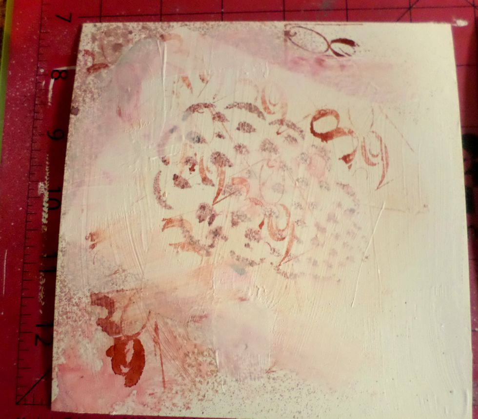 Add more Gesso on the block to soften some of the harder lines from the stencil and stamps. Let dry.