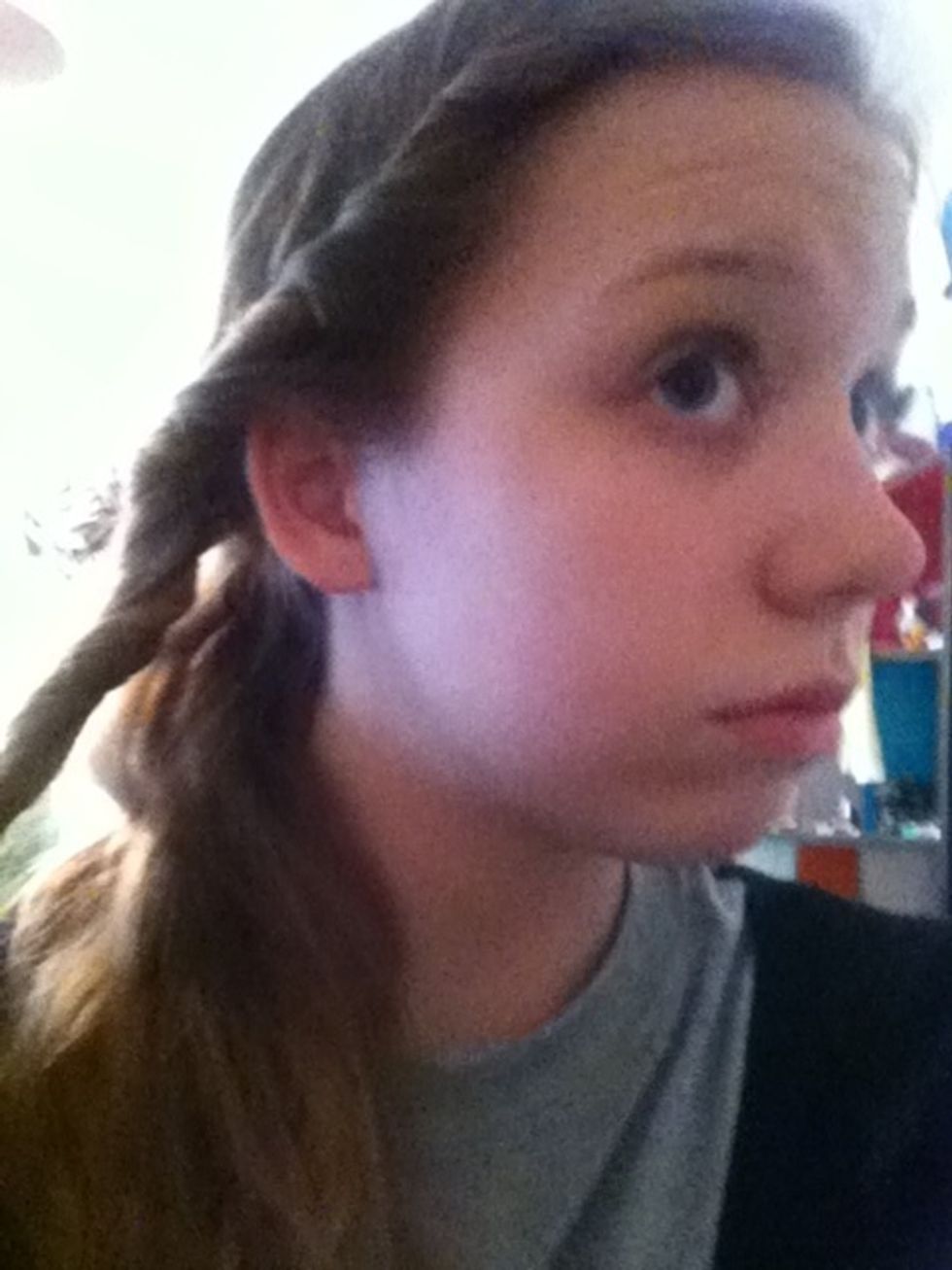 Add more hair until you reach the end..gather all hair on side with twist.