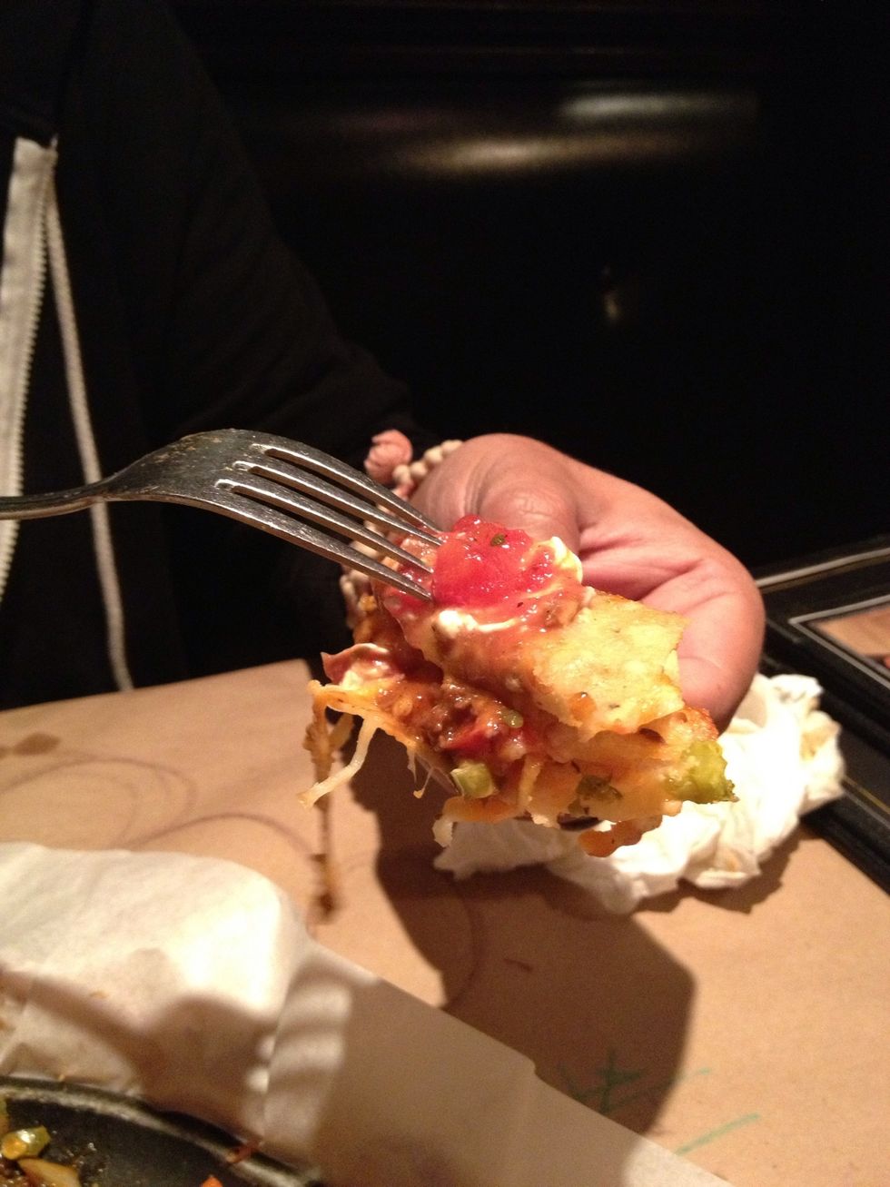 Add more toppings, sour cream and salsa.