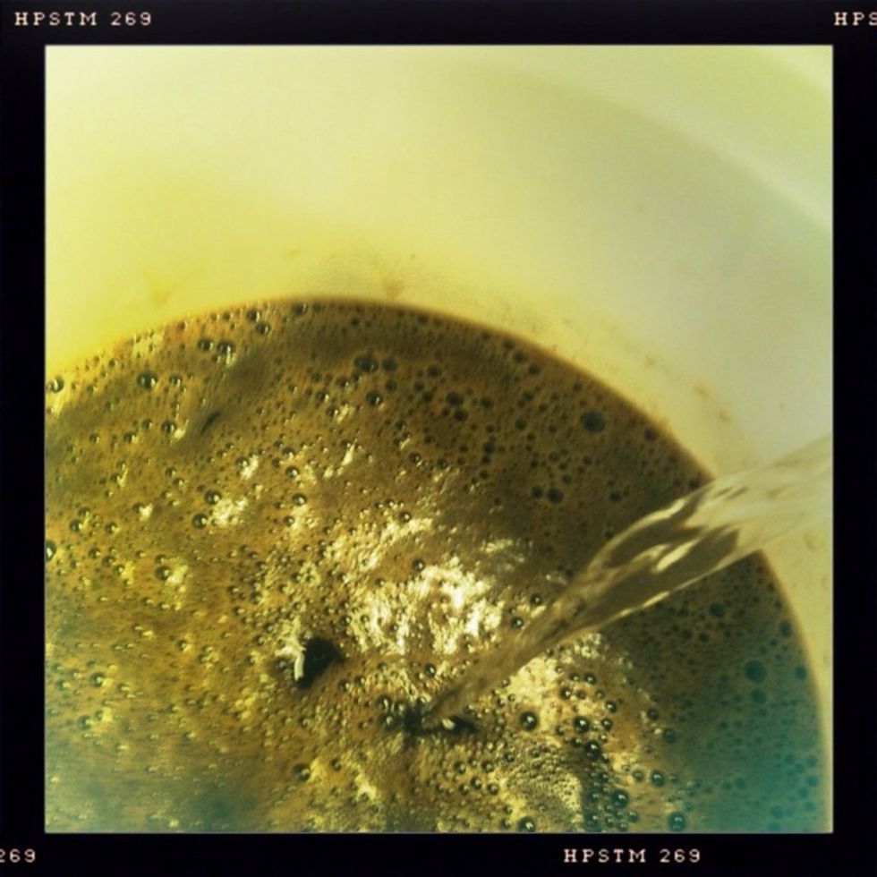 Add more water as needed until the volume is at 5 gallons. Seal the fermenter and aerate the wort by rocking it back and forth.