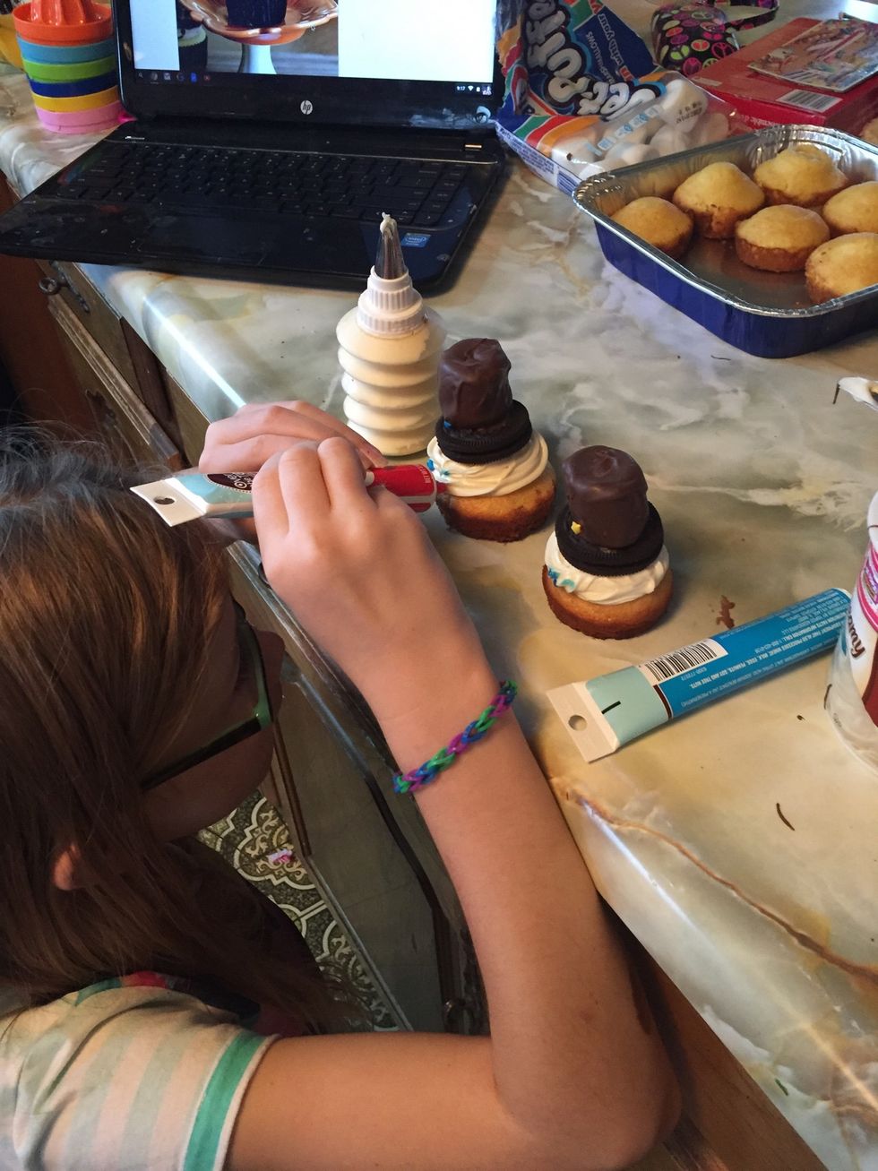 Add mouth - we used red gel icing
