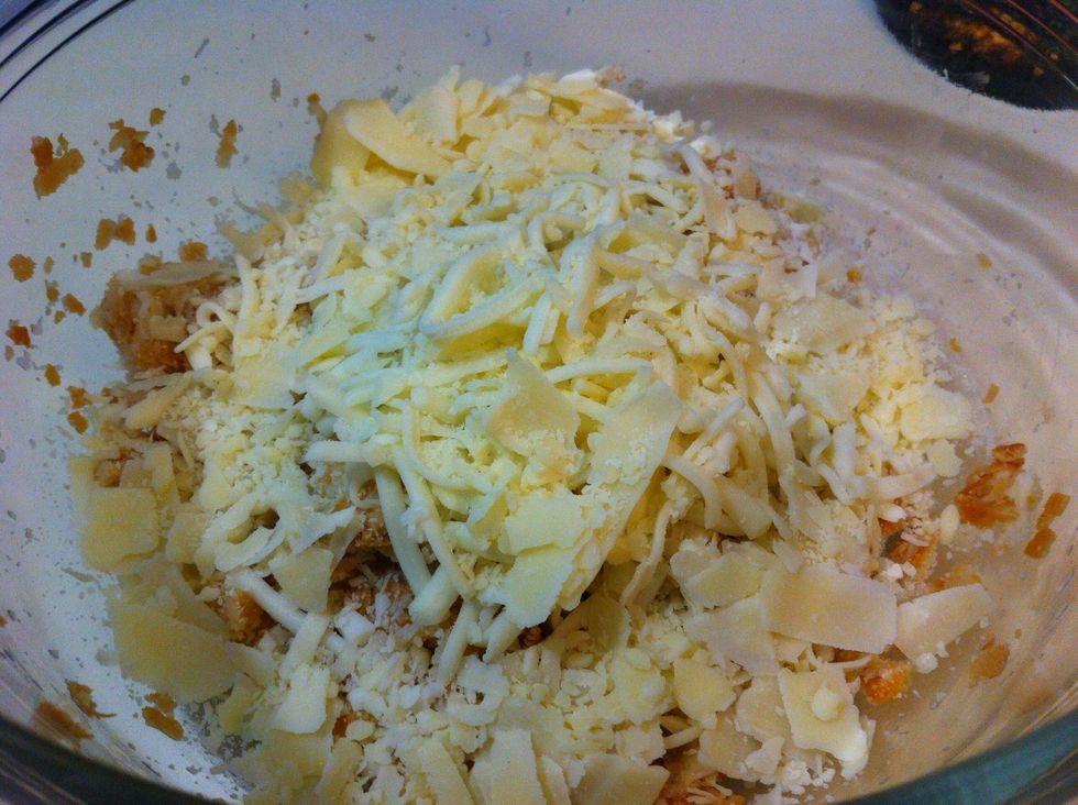 Add mozzarella and Parmesan to the mix