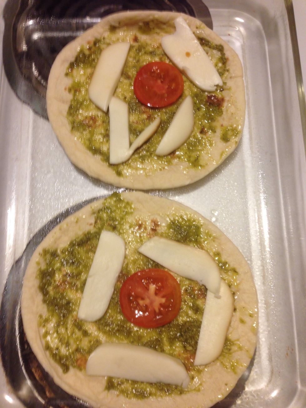 Add mozzarella, and red tomatoes.