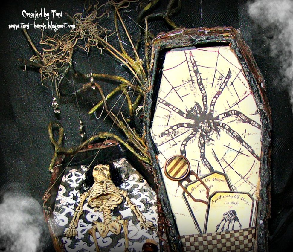Add Mr Skeleton to the coffin and here is a closeup of the tree with spiders and the webs.