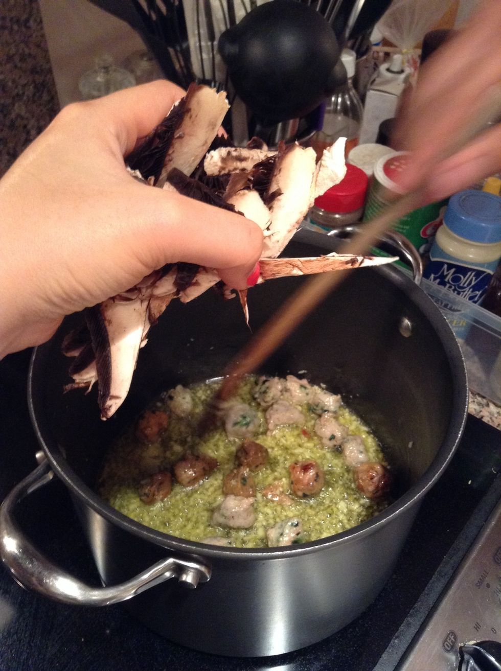 Add mushroom. Add the salt and crushed red pepper. Mix well.