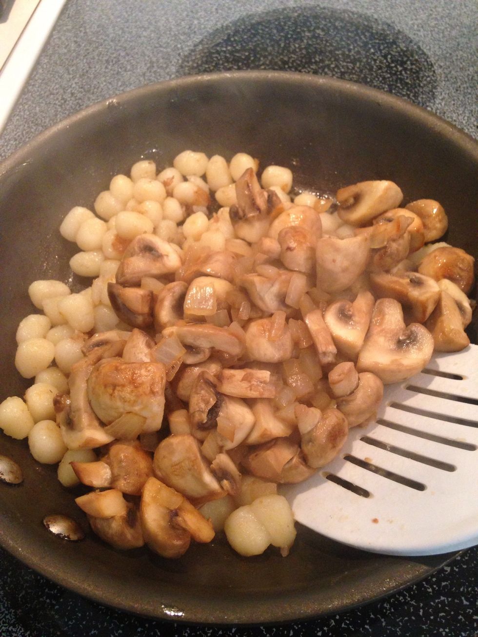 Add mushrooms and onions. Stir well. If you like garlic, add it here.