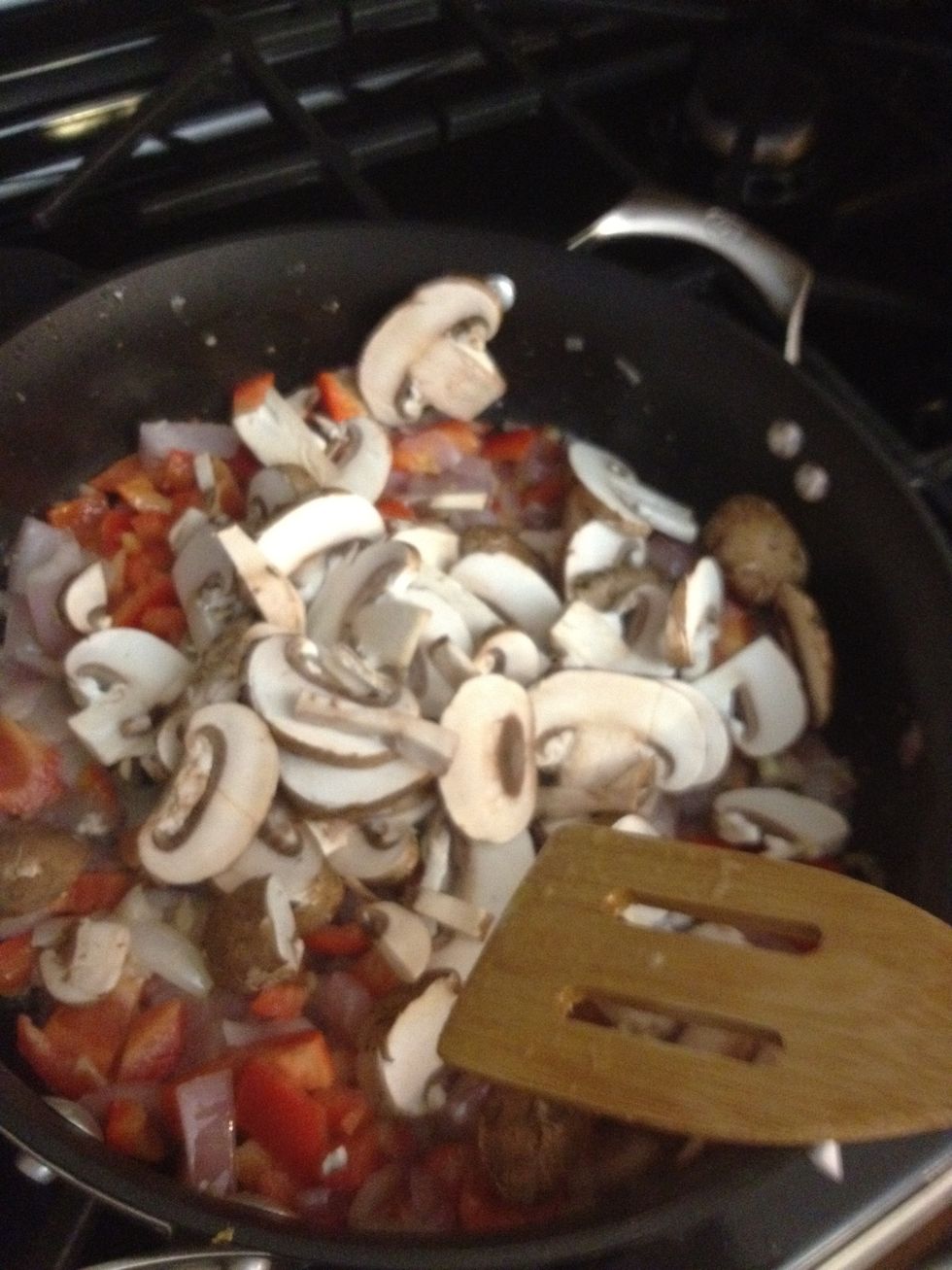 Add mushrooms and saut\u00e9 until everything is cooking well