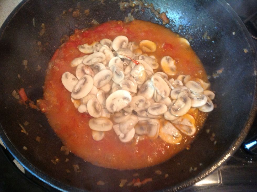 Add mushrooms and stir