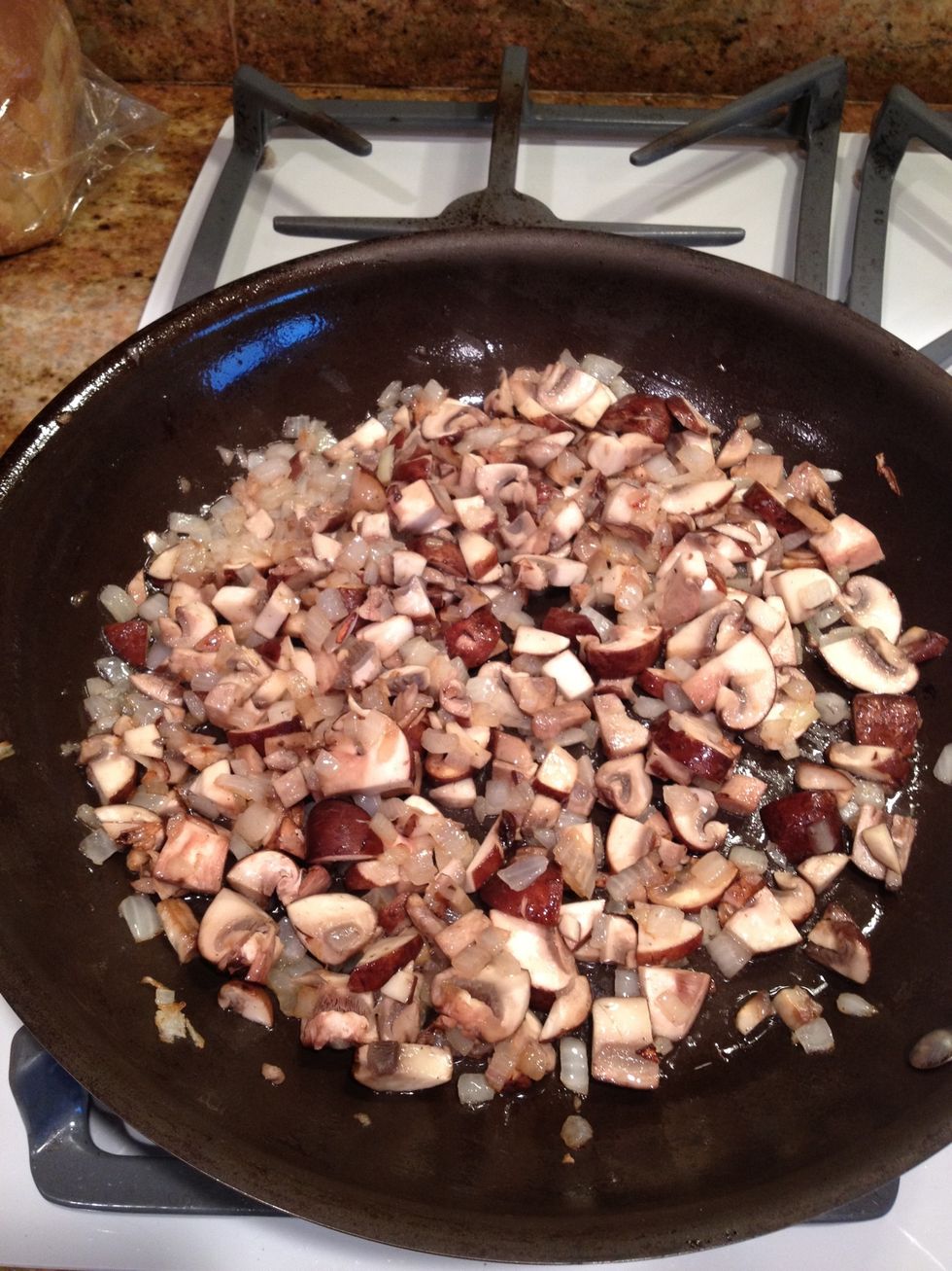 Add mushrooms to the onions