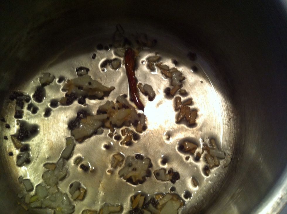Add mustard seeds & whole dried chilli. Increase the heat& The mustard will start to crackle
