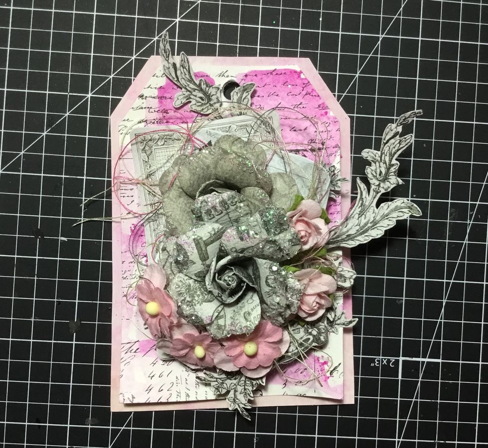 Add next grey flower as shown.