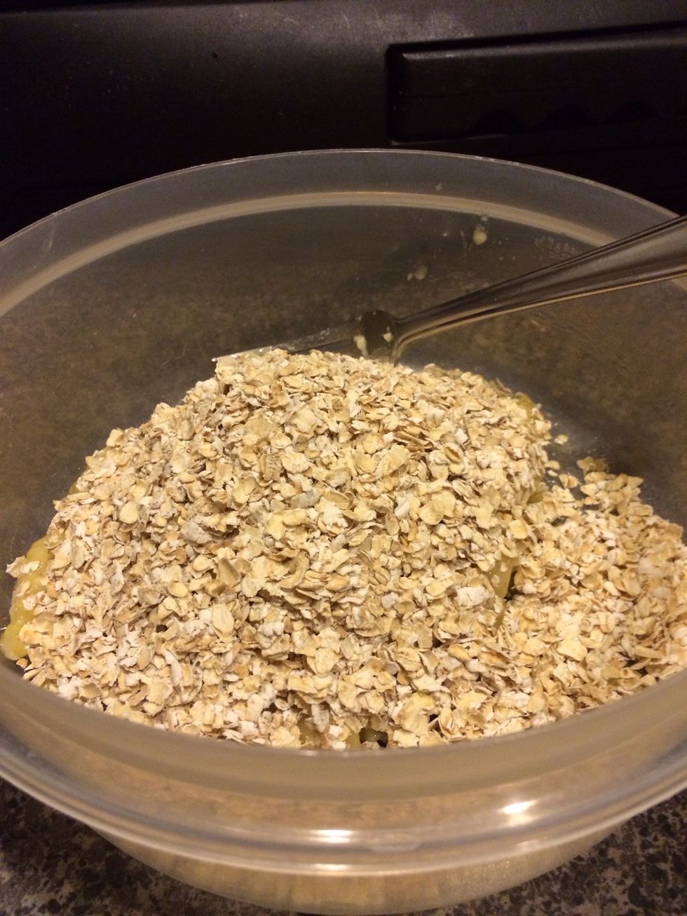 Add oatmeal to mashed bananas